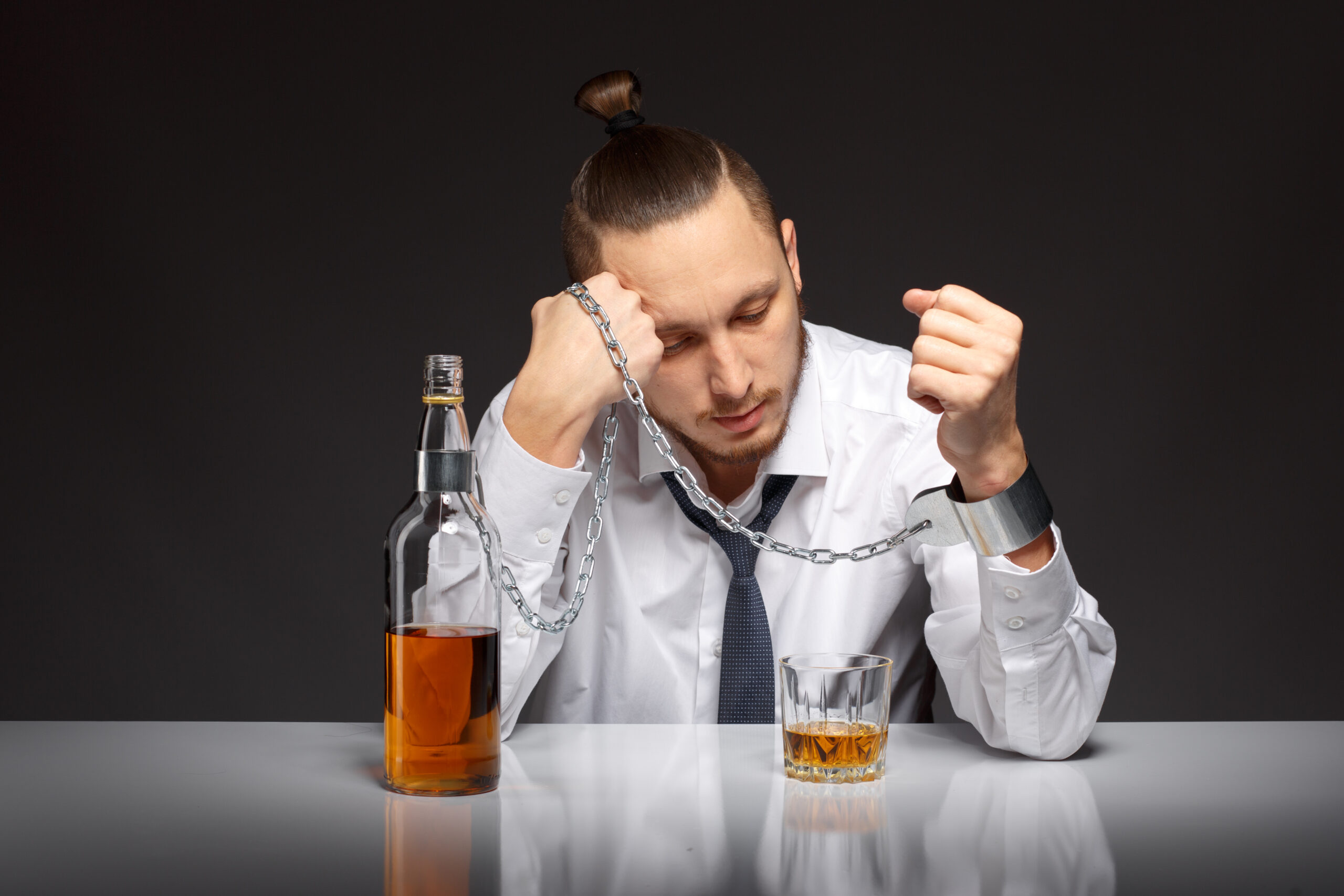 lonely-entrepreneur-with-glass-whiskey